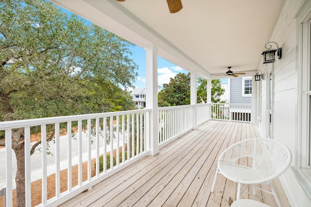 wooden deck with ceiling fan