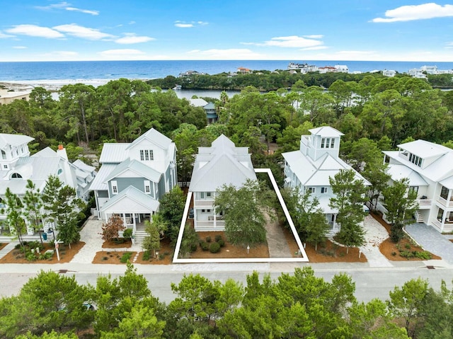 drone / aerial view featuring a water view