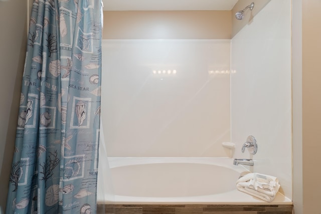 bathroom featuring separate shower and tub