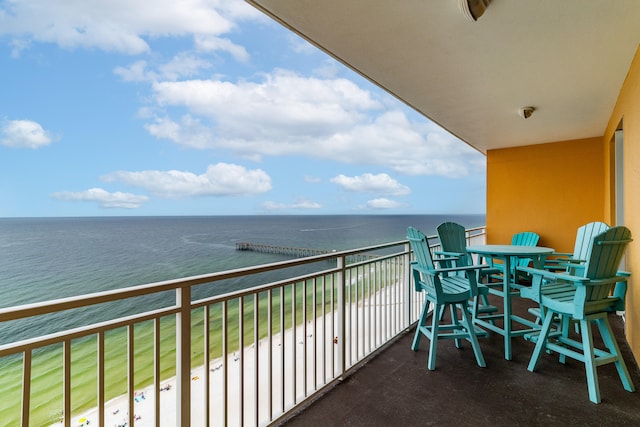 balcony featuring a water view