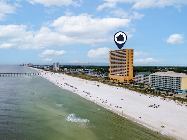 aerial view featuring a view of the beach and a water view