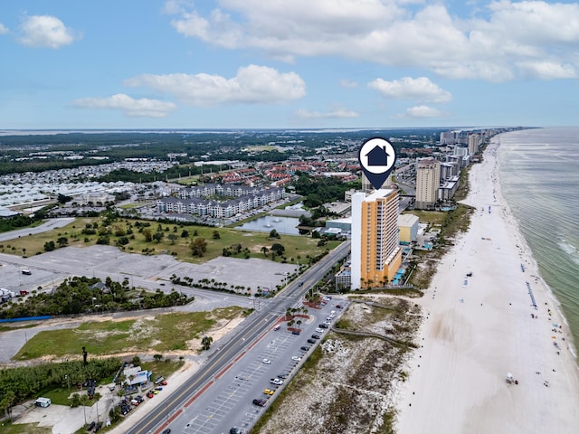 drone / aerial view with a view of the beach and a water view