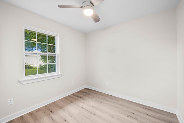 empty room with light wood-type flooring, ceiling fan, and plenty of natural light