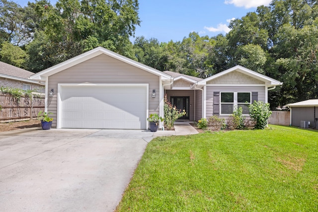 ranch-style home with a garage, central air condition unit, and a front yard