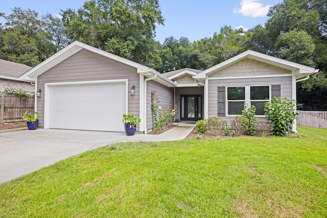 single story home featuring a front yard and a garage