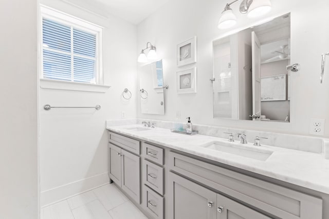 bathroom with vanity and a shower