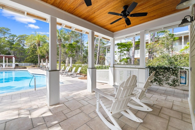 47 Trail Ln, Santa Rosa Beach, FL 32459 - unfurnished sunroom featuring wooden ceiling and stone tile floors
