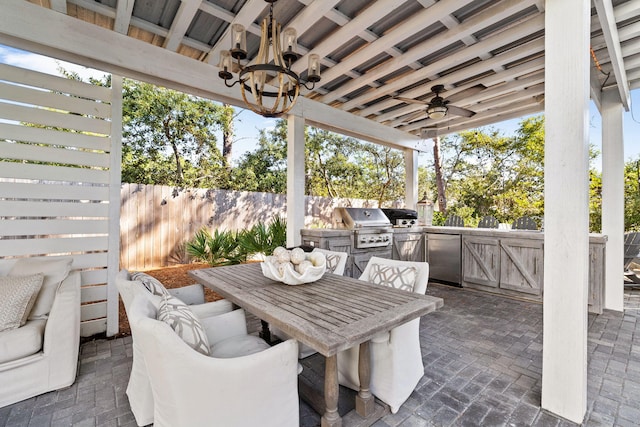 view of patio / terrace featuring exterior kitchen, area for grilling, and ceiling fan