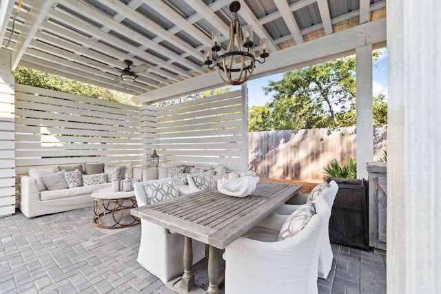 view of patio / terrace with an outdoor living space and ceiling fan