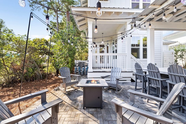 view of patio featuring a fire pit