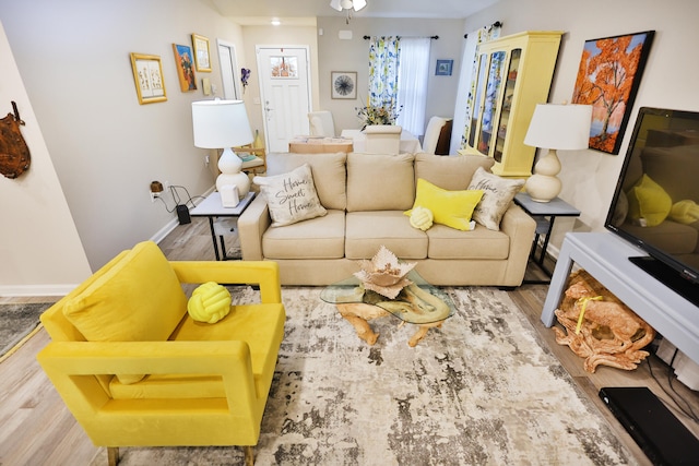 living room with light hardwood / wood-style floors