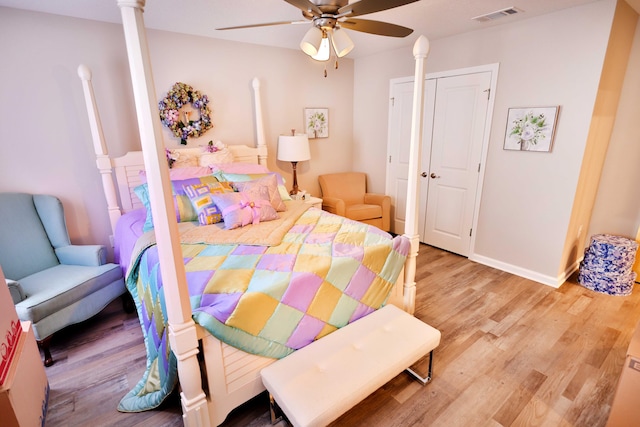 bedroom featuring light wood-type flooring and ceiling fan