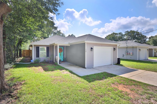 single story home with a garage and a front yard