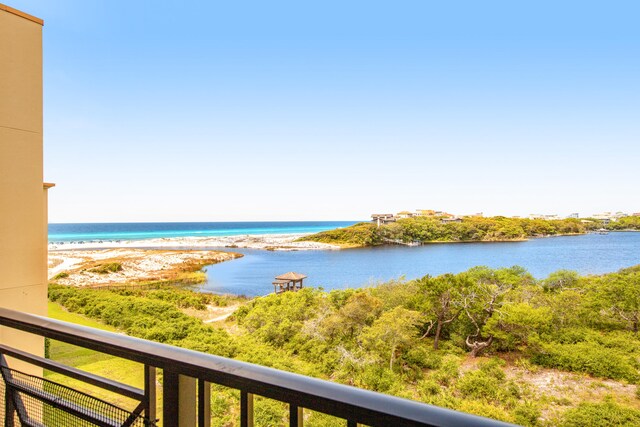 property view of water featuring a beach view