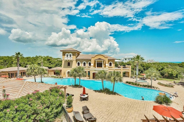 view of pool with a patio