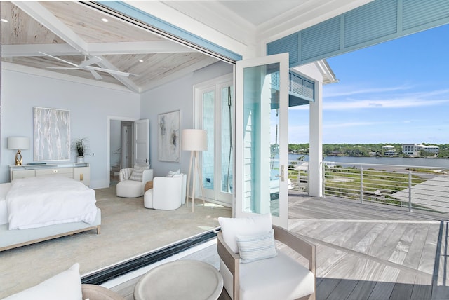 bedroom featuring wooden ceiling, a water view, access to exterior, french doors, and beamed ceiling