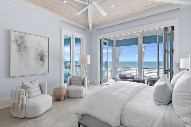 carpeted bedroom with access to exterior, wood ceiling, a water view, and multiple windows