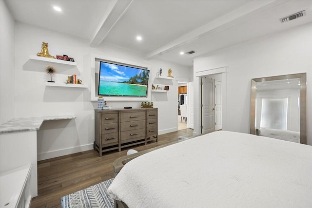 bedroom with dark hardwood / wood-style floors and beamed ceiling