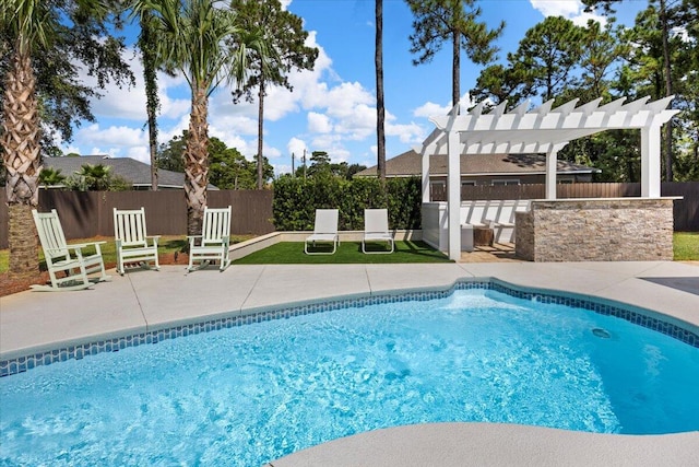 view of swimming pool featuring a pergola and a patio