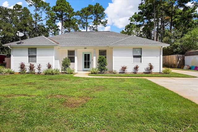 ranch-style house with a front yard