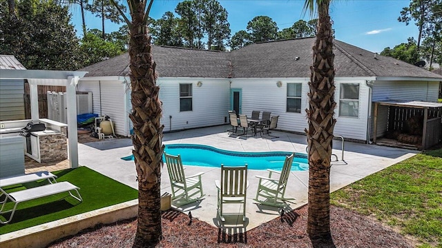 back of property featuring a patio area