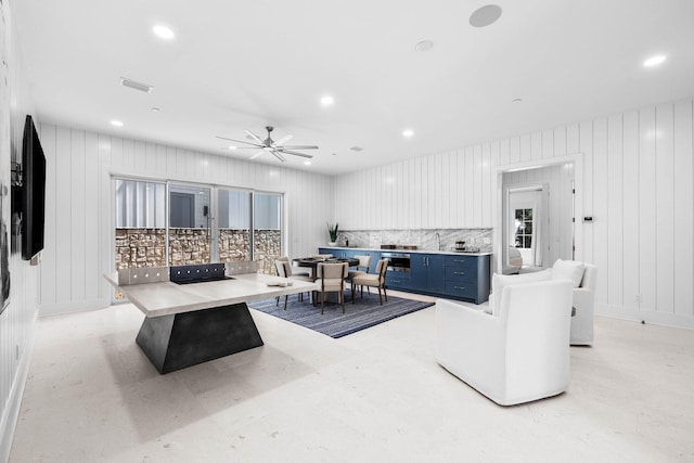 living room featuring ceiling fan