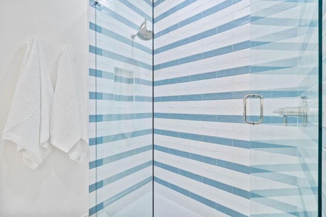 bathroom with an enclosed shower