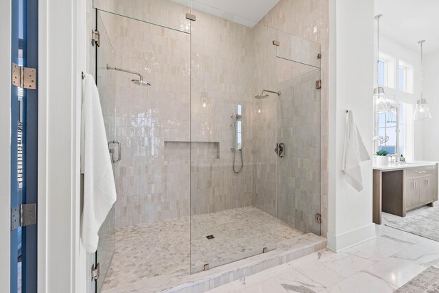 bathroom with vanity and an enclosed shower