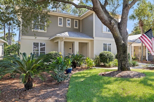 view of front of property featuring a front lawn