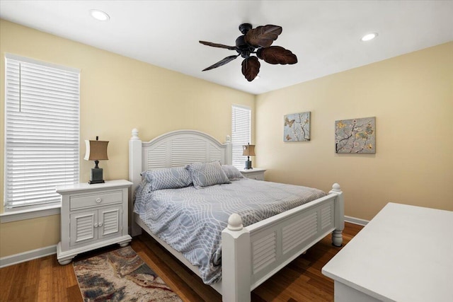 bedroom featuring ceiling fan and dark wood-type flooring