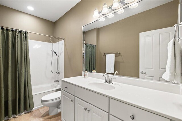 full bathroom with vanity, toilet, and shower / bath combination with curtain