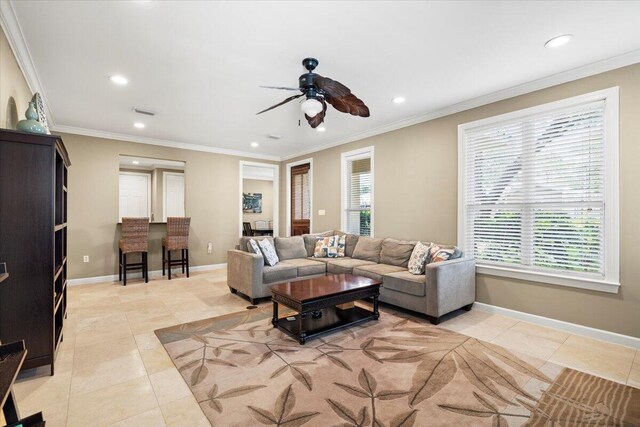 tiled living room with crown molding and ceiling fan