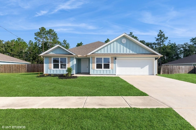 ranch-style home with a front lawn and a garage