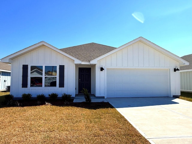 single story home with driveway, a shingled roof, board and batten siding, and an attached garage