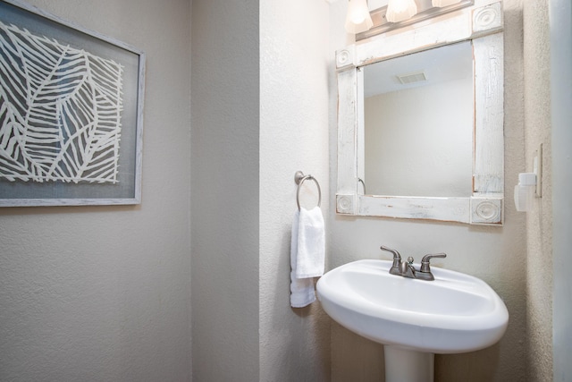 114 Main Sail Dr Unit 137, Miramar Beach, FL 32550 - bathroom with a sink and a textured wall
