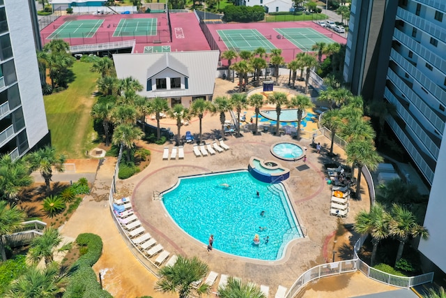 view of swimming pool featuring a patio area