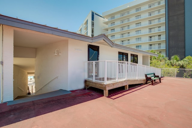 114 Main Sail Dr Unit 137, Miramar Beach, FL 32550 - back of house featuring stucco siding