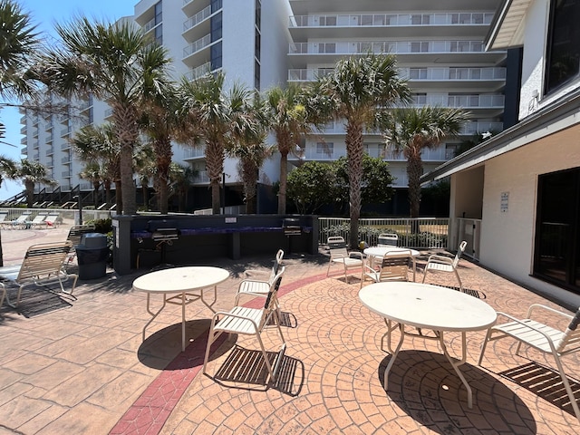 view of patio / terrace with a balcony