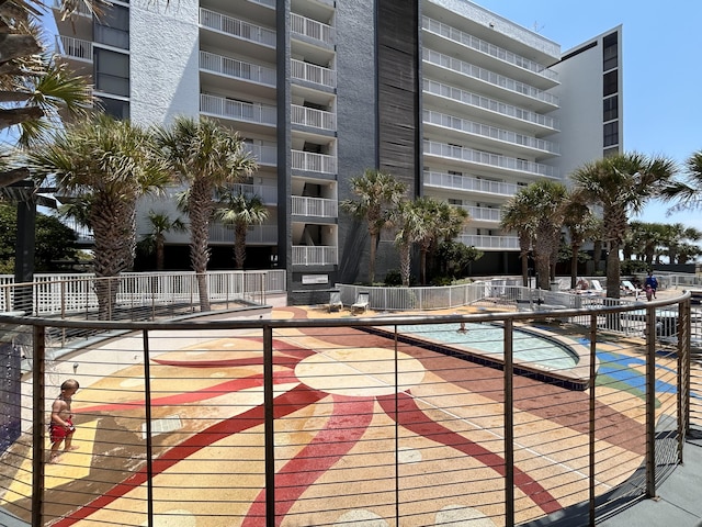 114 Main Sail Dr Unit 137, Miramar Beach, FL 32550 - community pool featuring fence and a patio area