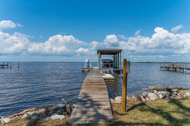 dock area featuring a water view