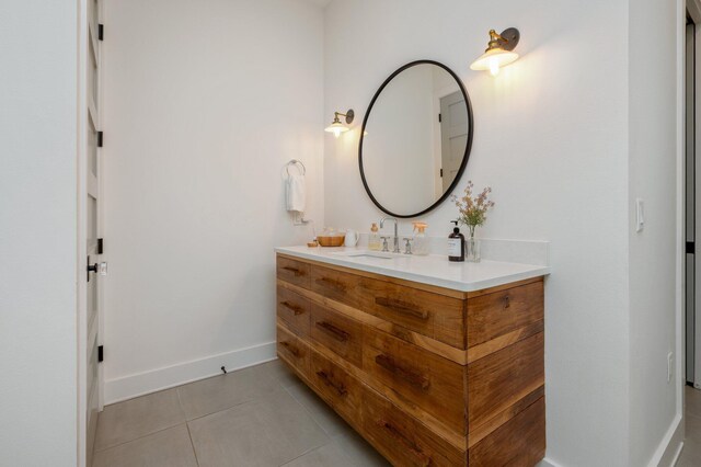 bathroom featuring tile patterned floors and vanity