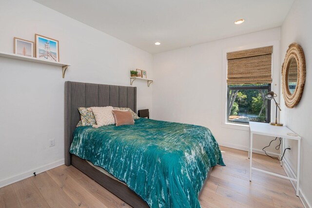 bedroom featuring wood-type flooring