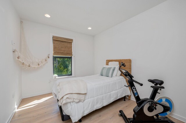 bedroom with light hardwood / wood-style flooring