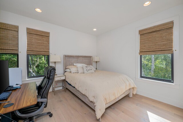 bedroom with light wood-type flooring