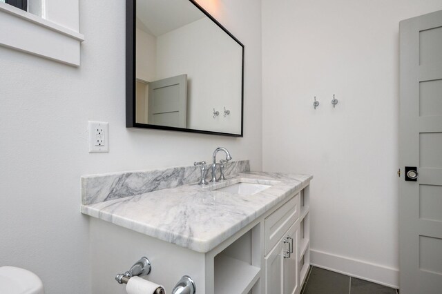 bathroom featuring vanity and tile patterned flooring