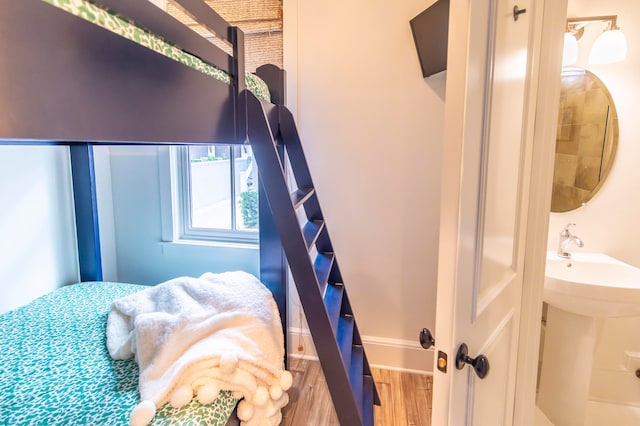 bedroom featuring hardwood / wood-style flooring