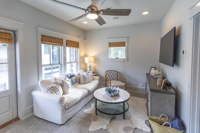 living room featuring ceiling fan