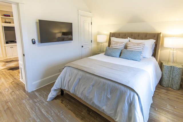 bedroom featuring light hardwood / wood-style floors