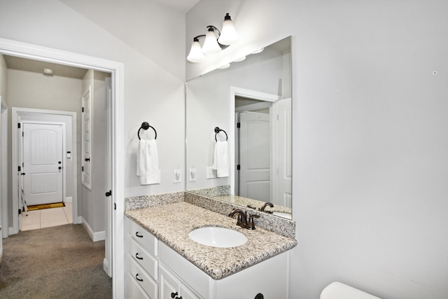 bathroom with vanity and tile patterned floors