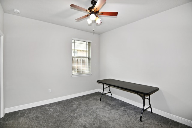 miscellaneous room featuring ceiling fan and dark colored carpet